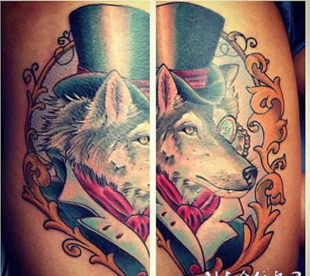 大臂上的绅士狐狸纹身图案