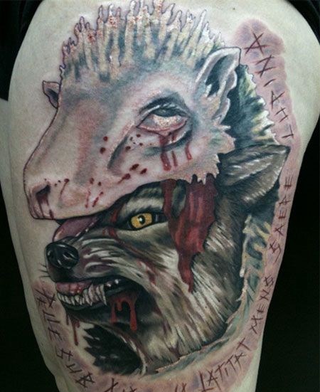大臂血狼和羊纹身图案