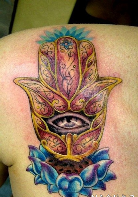 后背上的莲花眼睛纹身图案