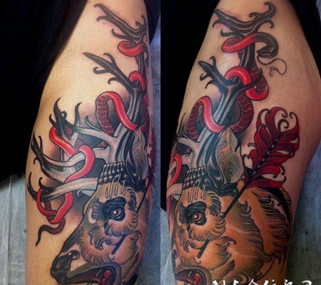 大臂上的鹿头纹身图案