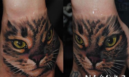 手背上的猫头纹身图案