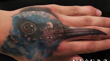 手背上的小鸟纹身图案