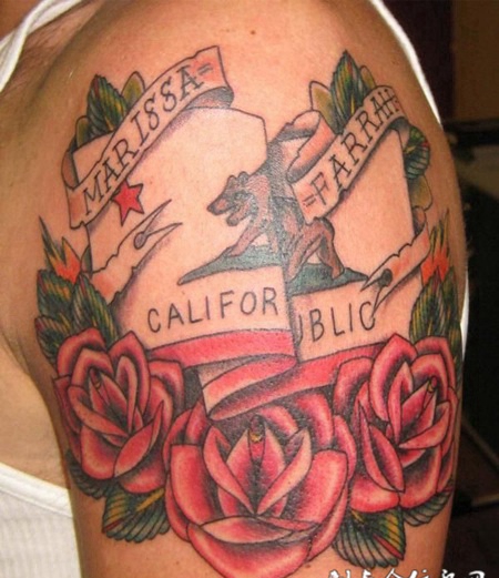 大臂上的玫瑰花扑克牌纹身图案