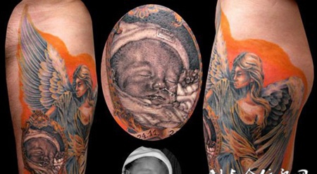 大腿上的天使婴儿纹身图案