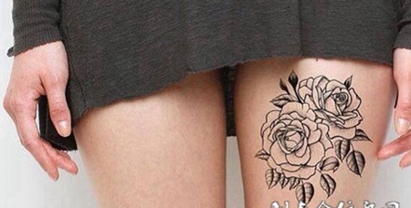 大腿上的线条玫瑰花的纹身图案