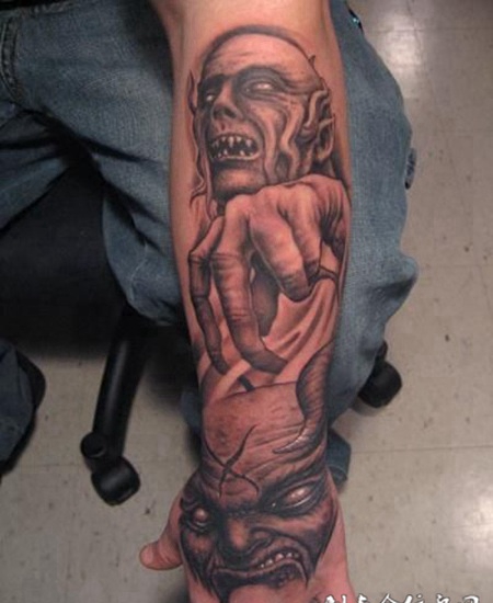 小臂上的黑灰恶魔纹身图案