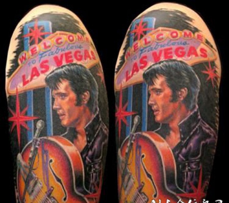 大臂上拉大提琴的男子纹身图案