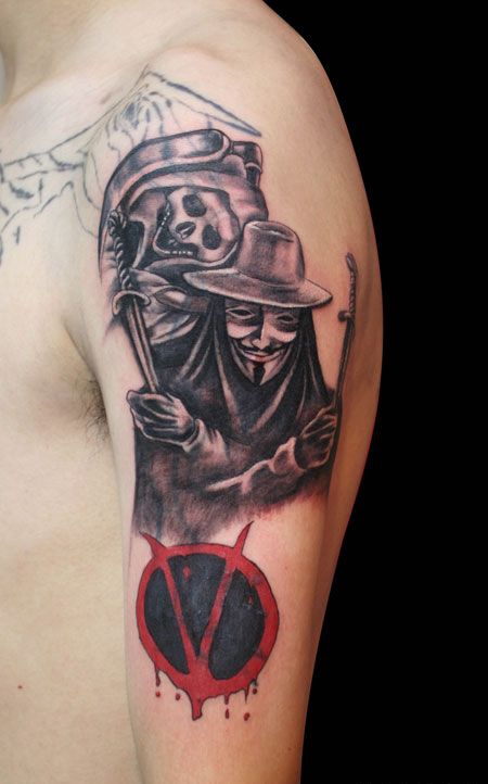 大臂死神小丑纹身图片