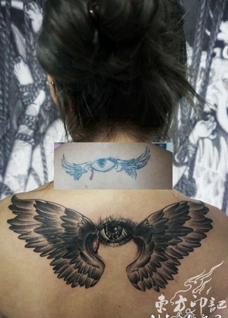 后背上的眼睛翅膀遮盖纹身图案
