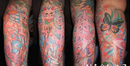 胳膊上的动画招财猫纹身图案
