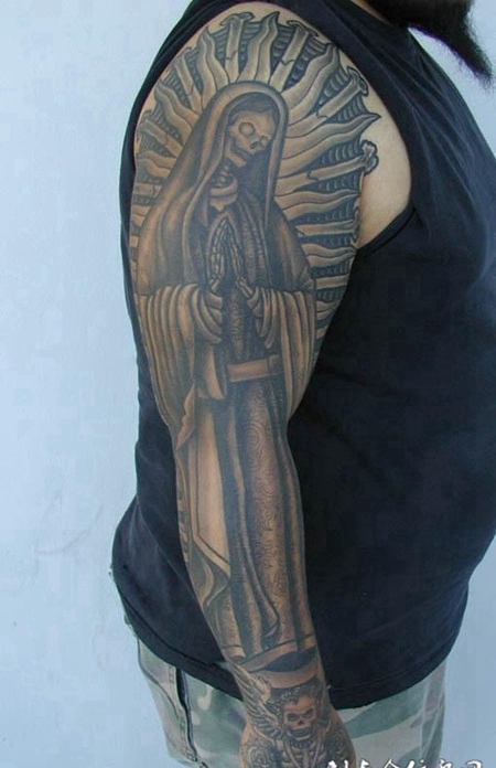 花臂骷髅女纹身图案