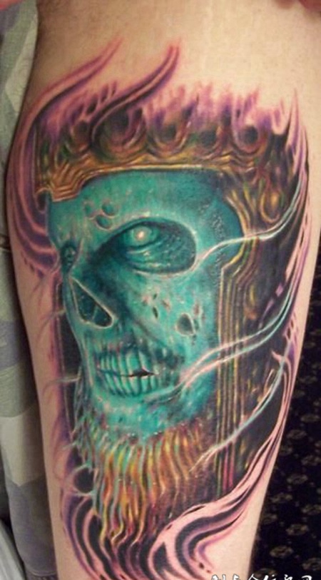 小臂上的绿色耶稣纹身图案