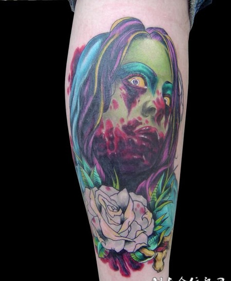 小腿上的丧尸花朵纹身图案