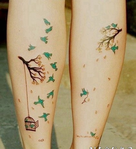 小腿上的树枝鸟笼子纹身图案