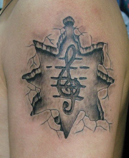 大臂石刻音乐符号纹身图案