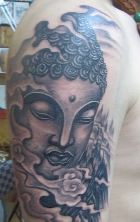 胳膊上的如来佛祖纹身图案