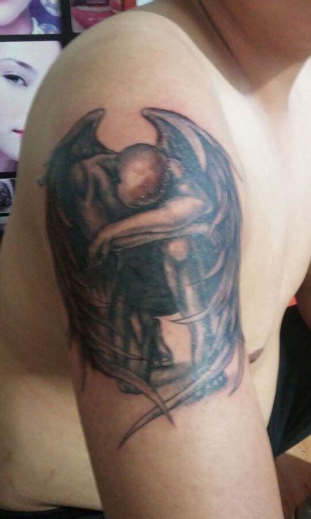 大臂堕落天使纹身图片