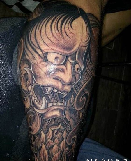 霸气的腿部神兽纹身图片