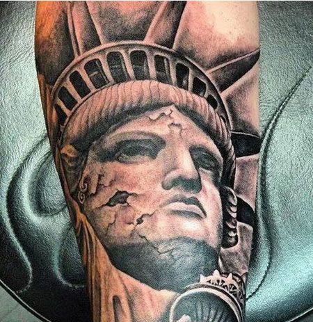 小腿精美的自由女神纹身图片