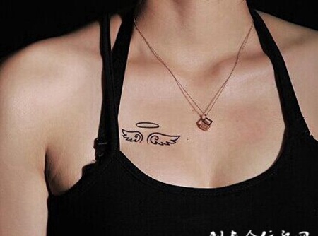 胸部个性翅膀图腾纹身图案