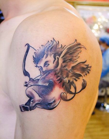 大臂丘比特纹身图片