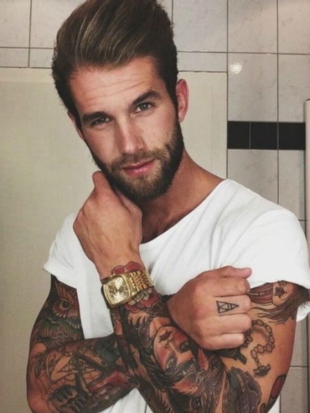 男人手臂精美的肖像纹身图片