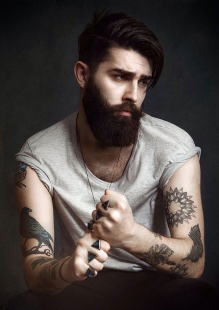 欧美男士手臂乌鸦纹身图片