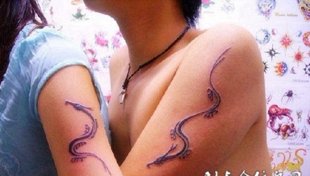 情侣好看的大臂龙图腾纹身图片