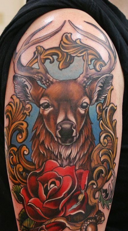 大臂玫瑰麋鹿纹身图案