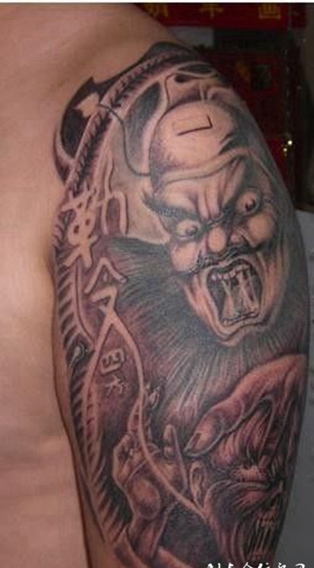 男人霸气的手臂钟馗纹身图案