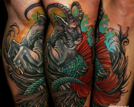 小腿上的羊头鱼尾纹身图案