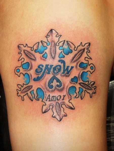 手臂上的冰晶雪花纹身图案