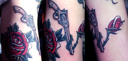 手臂手枪玫瑰纹身图案