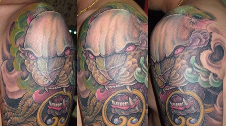 大臂唐狮子纹身图案