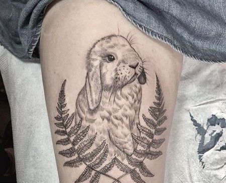 点线大腿兔子纹身图案