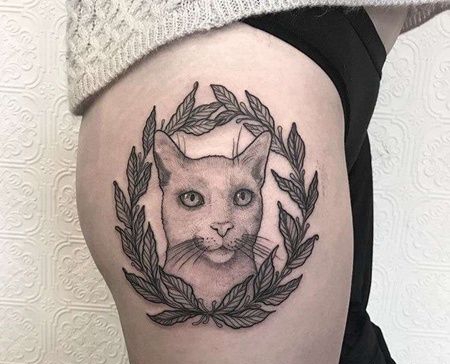 点线大腿猫纹身图案