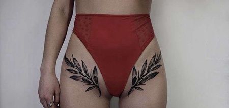 大腿叶子纹身图案