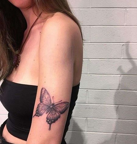 New School大臂蝴蝶纹身图案