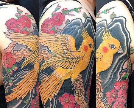 新传统大臂鹦鹉纹身图案