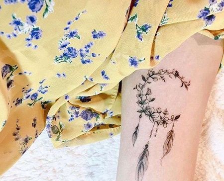 小清新大臂花卉羽毛纹身图案