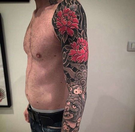 日式胳膊牡丹唐狮纹身图案