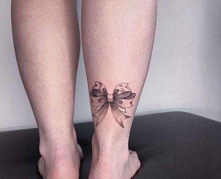 New School小腿蝴蝶结纹身图案
