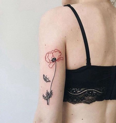 线条大臂花卉蝴蝶纹身图案