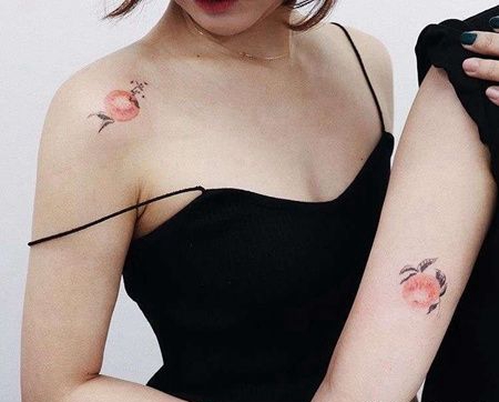 水彩大臂桃子纹身图案