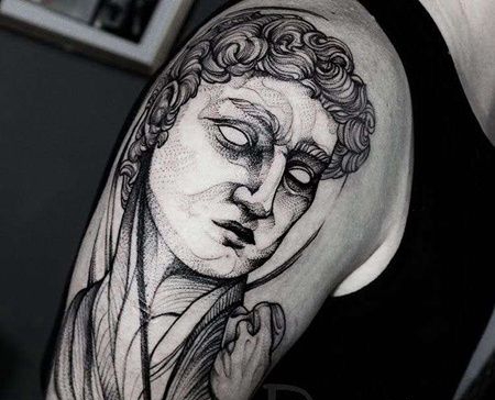 点线大臂雕像纹身图案