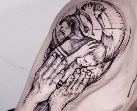 点线大臂手人像纹身图案