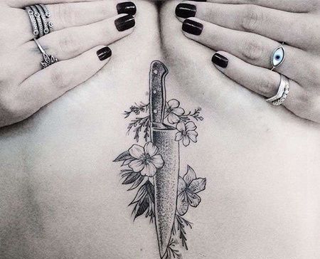 点线腹部匕首纹身图案