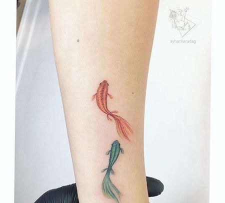 水彩小臂金鱼纹身图案