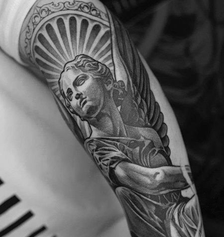 写实小臂雕像纹身图案