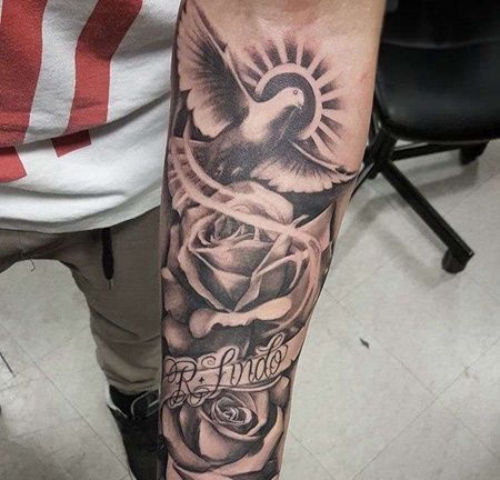 写实小臂玫瑰鸽子纹身图案